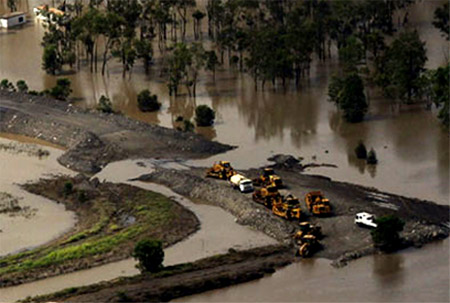 Coal mine machinery surrounded by floodwater