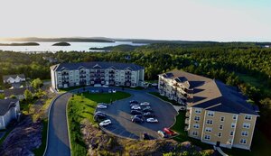 RE Investment Co. Buys Two Housing Properties